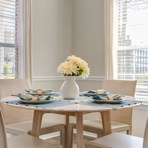 Spacious dining area with large windows 